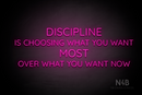 "DISCIPLINE IS CHOOSING WHAT YOU WANT MOST OVER WHAT YOU WANT NOW" (Castle font) - LED neon sign