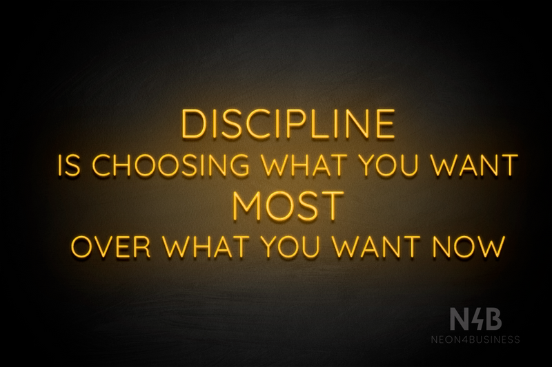 "DISCIPLINE IS CHOOSING WHAT YOU WANT MOST OVER WHAT YOU WANT NOW" (Castle font) - LED neon sign