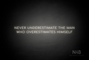 "Never Underestimate The Man Who Overestimates Himself" (Cooper font) - LED neon sign